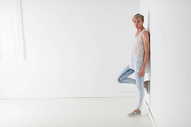 istock Fair Haired Man In A Minimalist Room 614144408