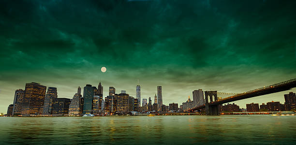 istock Brooklyn Bridge and Freedom Tower in the moonlight, NYC. 614145004