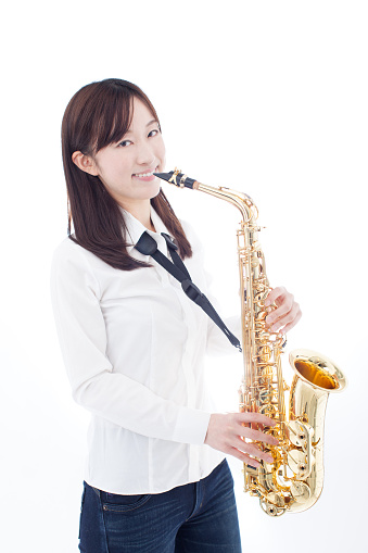 Woman playing saxophone