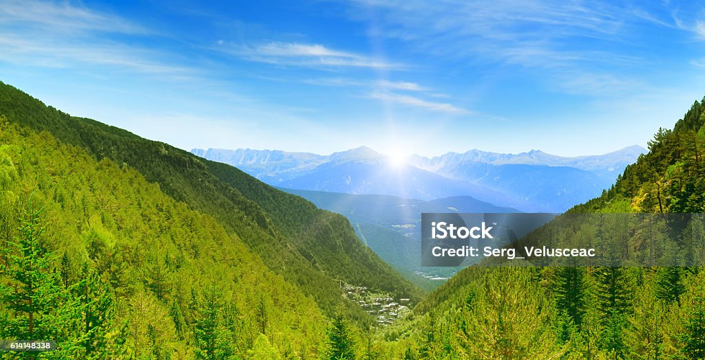 Dawn in the picturesque mountains covered with forests. Dawn in the picturesque mountains covered with forests. Andorra, Pyrenees Tree Stock Photo