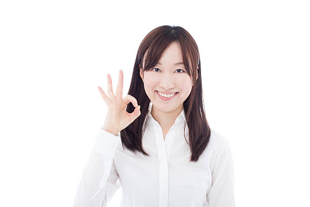 istock Businesswoman making ok sign 614149254