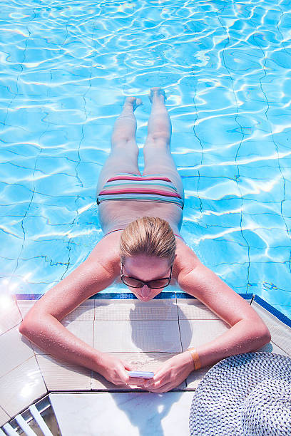 istock Relax on vacation with your phone. 614150040