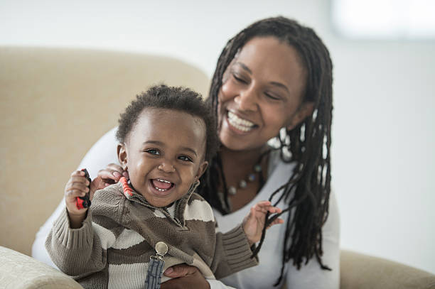 istock Mother and Son Laughing Together 614150892