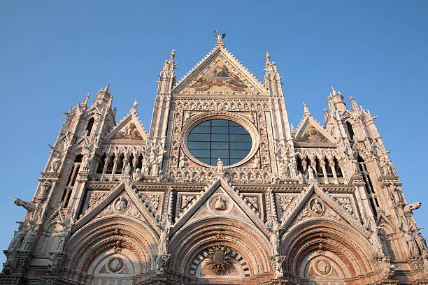istock Cathedral Tower and Dome in Siena 614151428