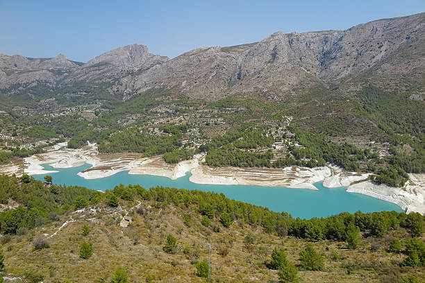 view of the valley and reservoir of guadalest seen from the village of El castell de guadalest in the province of alicante, spain