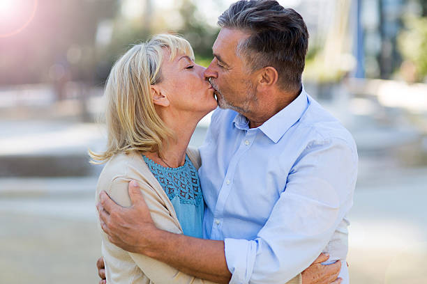 istock Mature Couple Kissing 614207292