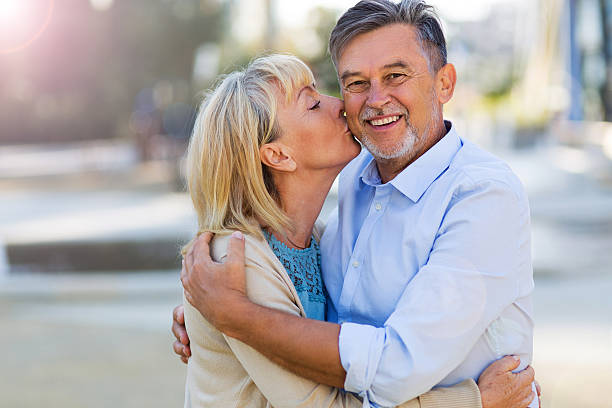 istock Mature Couple Kissing 614207372