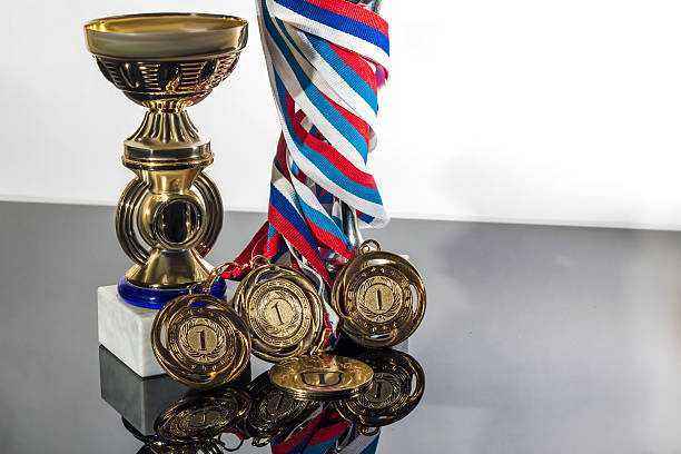 istock Sports Cup and medal on a black  white background 614208622