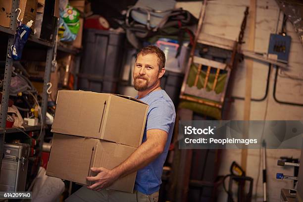 Hes On Top Of The Moving Game Stock Photo - Download Image Now - Garage, Box - Container, Storage Room