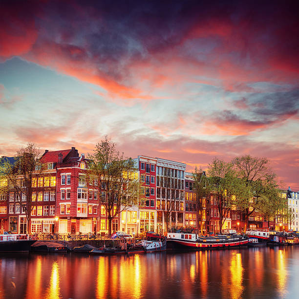istock Amsterdam canal on the west. Amsterdam is the capital 614209214