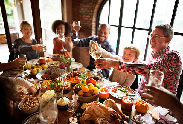 istock People Cheers Celebrating Thanksgiving Holiday Concept 614209290