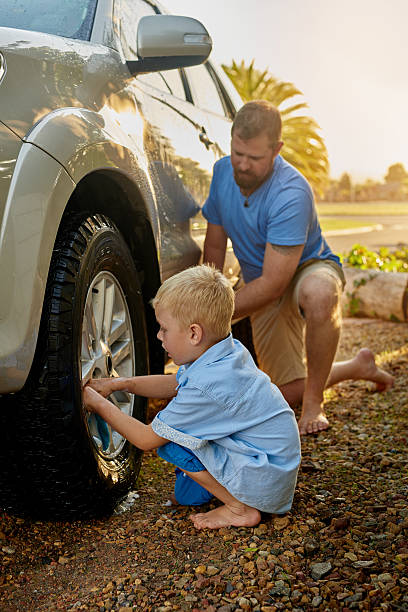 istock Giving the car a good scrub 614209440