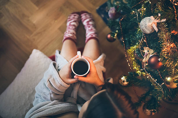 istock Cup of coffee at christmas morning 614210118