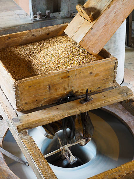 istock Grain hopper for stone grinding bread flour 614210968