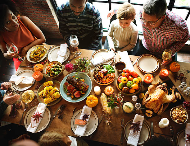 istock People Celebrating Thanksgiving Holiday Tradition Concept 614212886