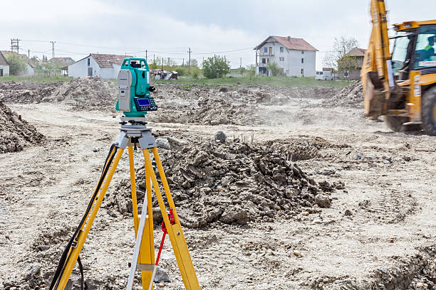 istock Geodesist device on a building site. Civil engineer with theodol 614213538