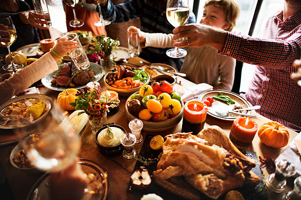 istock People Cheers Celebrating Thanksgiving Holiday Concept 614213632