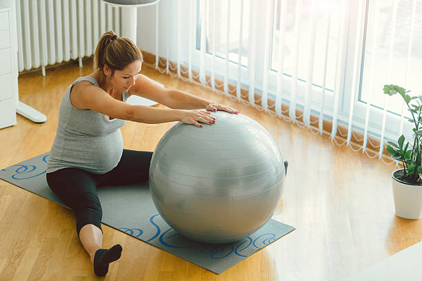 istock Pregnant Woman Exercising Pilates. 614213690