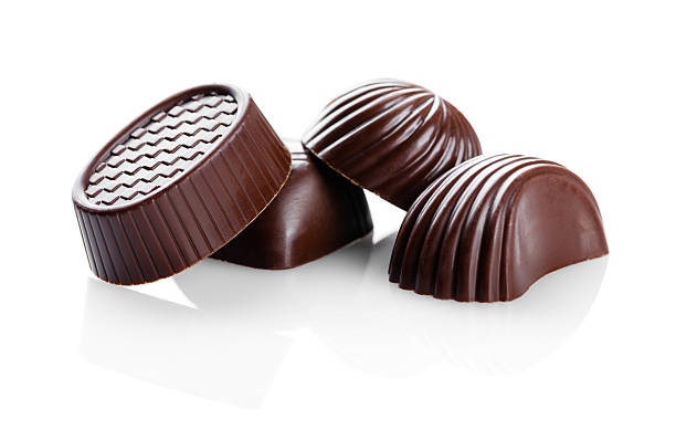 istock sweets, chocolate candies closeup 614216584