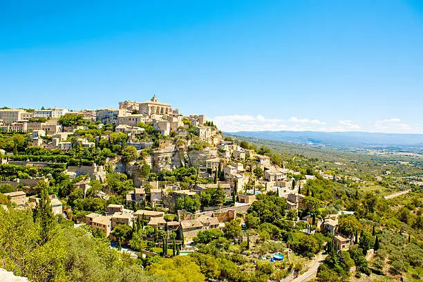 View on Gordes, a small typical town in Provence, France. Beautiful village, with view on roof and landscape
