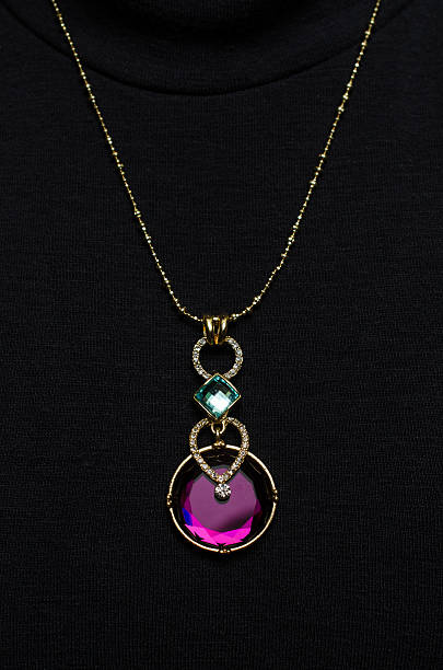 istock Pendant with sapphire on a black background 614218622