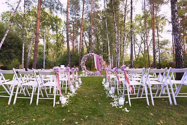 istock Beautiful wedding set up.  ceremony place in the forest 614223010