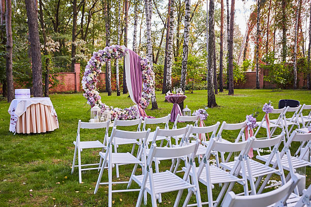 istock Beautiful wedding set up.  ceremony place in the forest 614223304