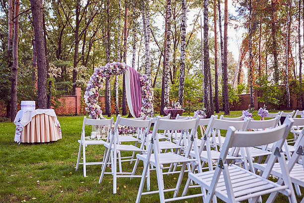 istock Beautiful wedding set up.  ceremony place in the forest 614223368