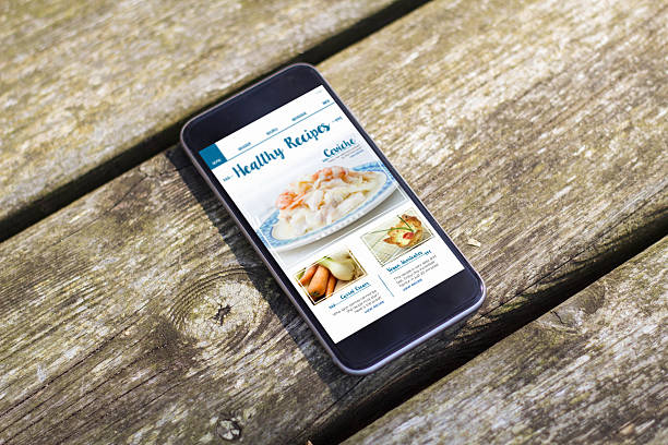 istock smartphone wood table healthy recipes 614224396