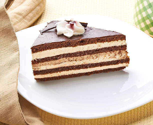 istock cream chocolate fruit cake sweet food dessert 614224430