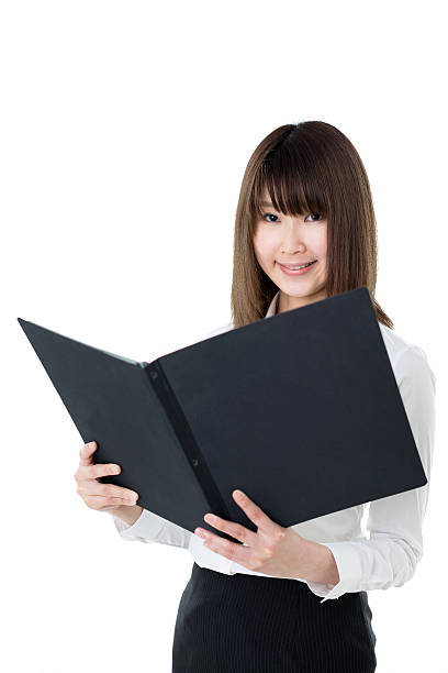 istock Businesswoman reading a file 614224550