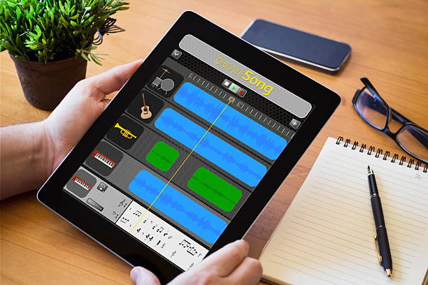 istock Music creation tablet on wooden workspace 614226676