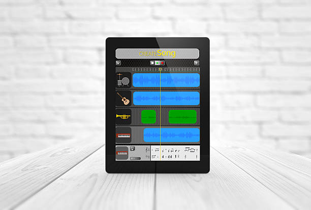 istock tablet with music creation app on wooden table 614226926