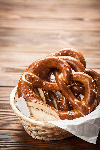 istock Pretzels on wooden table 614228518