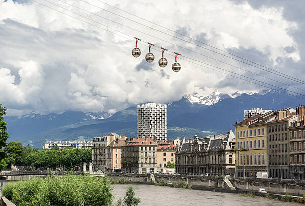 istock view of Grenoble with mountains and cable car 614228672