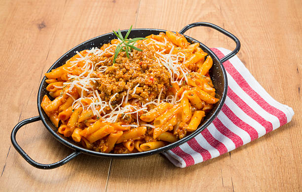 istock Pennes with meat and bolognese sauce 614229162