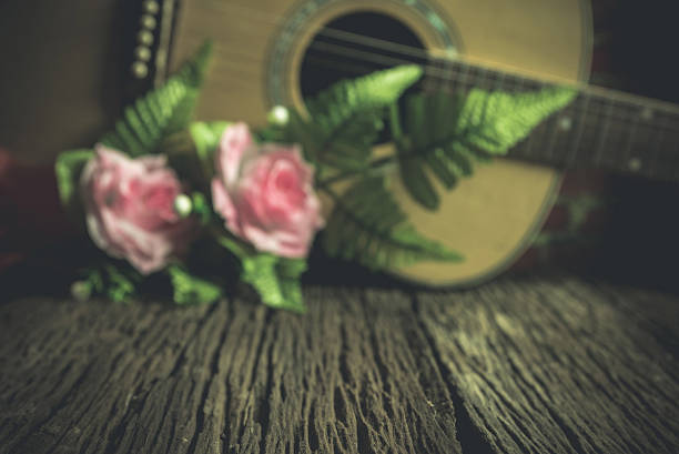 istock free space wooden with acoustic guitar 614230422