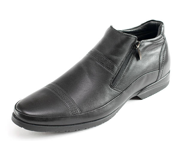 istock Black men's shoes from leather isolated on white background. 614230976