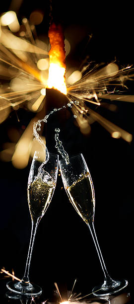 istock Champagne Glasses Infront Of Sparkler 614231544