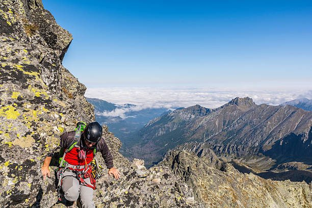 Mountaineer goes rock ridge in the Tatra Mountains.