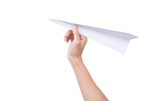 istock Hand holding paper plane isolated on white background. 614235902