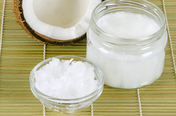 istock Coconut oil in glasses on bamboo mat horizontal 614236656