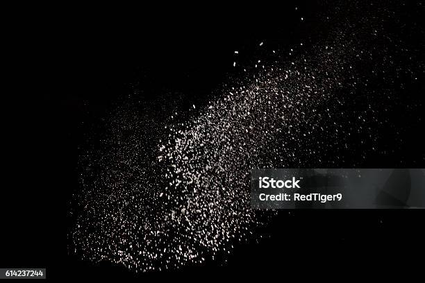 White Dust Debris Isolated On Black Background Stock Photo - Download Image Now - Flying, Rock - Object, Ruined