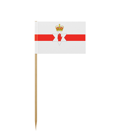 Tiny flag of Republic of Northern Ireland  on a toothpick. The flag has nicely detailed paper texture, High quality 3d render. Isolated on white background. Clipping path is included. 