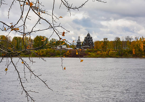 istock Autumn landscape with a wooden temple. 614241072