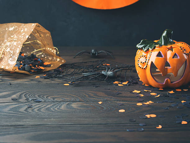 istock Halloween background on dark wooden table 614241660