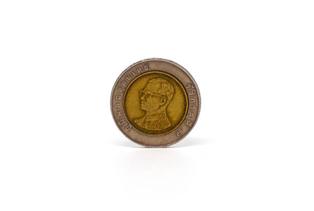 istock Thailand baht coins isolated over white background 614241740