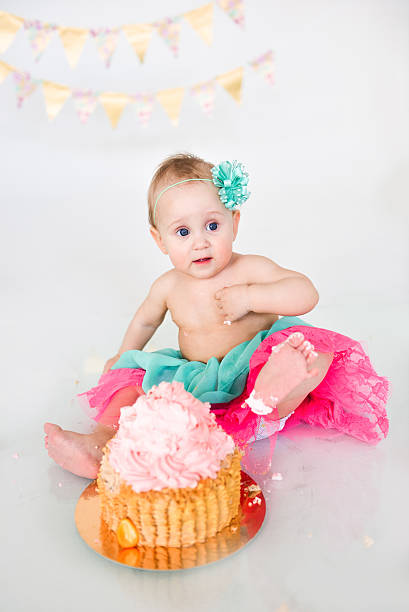 istock first birthday Portraits with smash cake 614243444