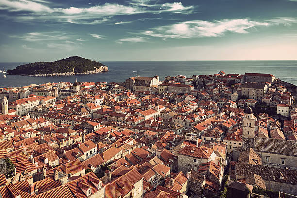 istock Panorama Dubrovnik Old Town roofs at sunset 614244664