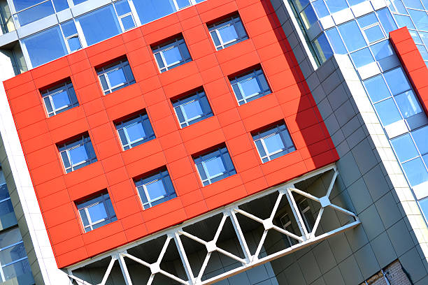 istock facade of the building red in the high-tech style 614245616
